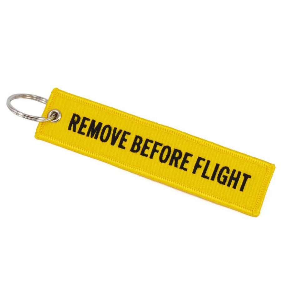캐리마켓 -  [페니앤코코] Remove Before Flight 키링 (Yellow)